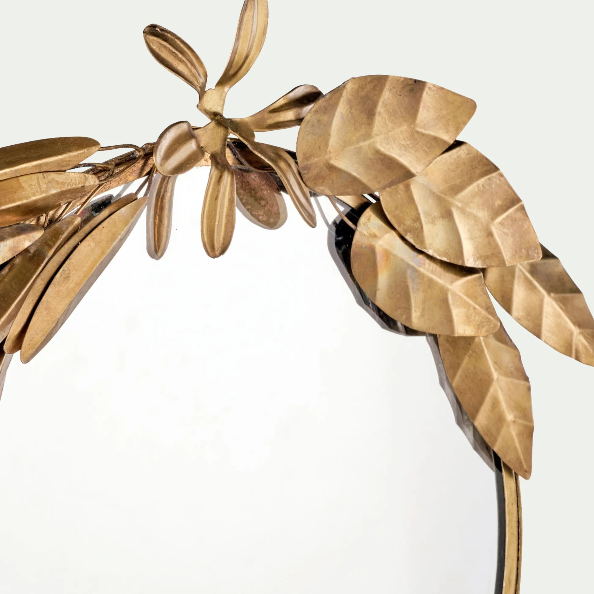 Miroir rond décoré de feuilles en laiton D27cm - doré